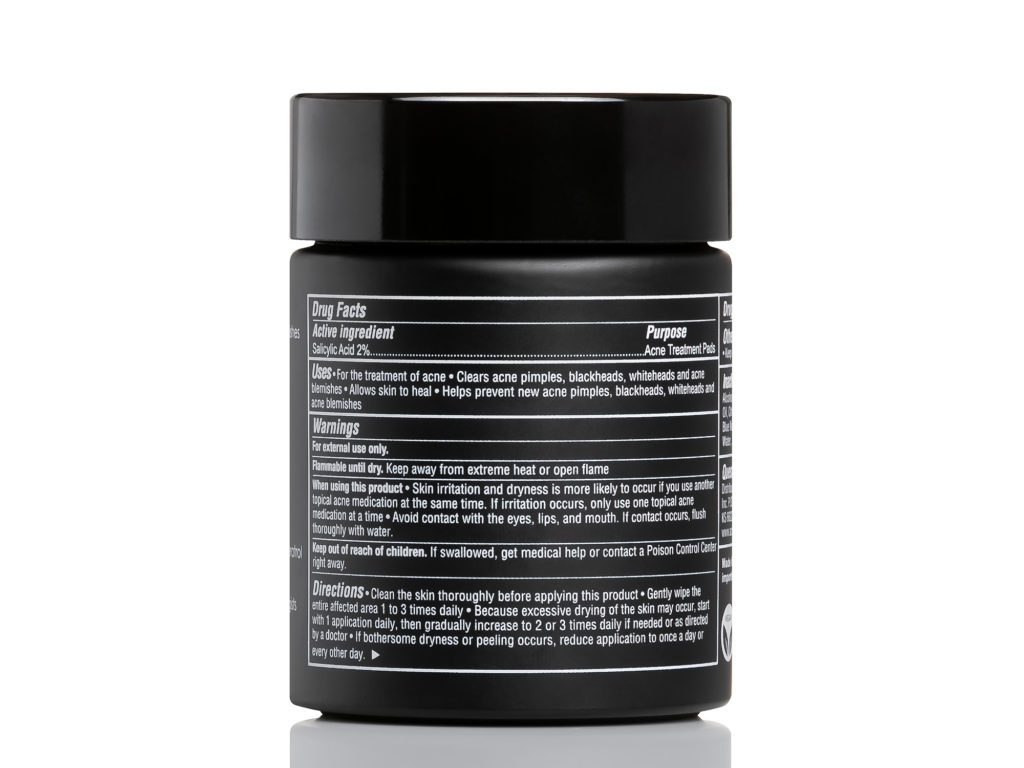 Acne BLU black glass jar containing 90 acne and blemish medicated pads showing Drug Facts