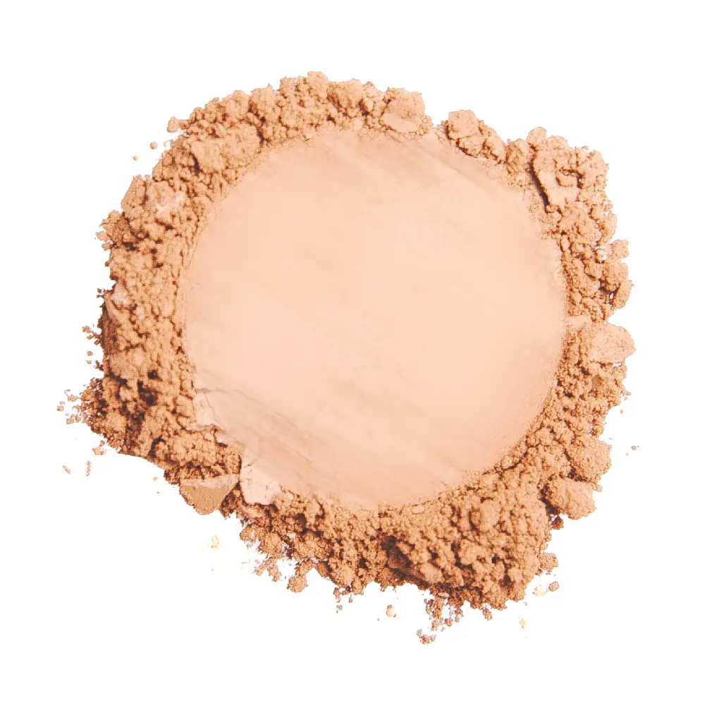 Close up image of makeup powder with a white background